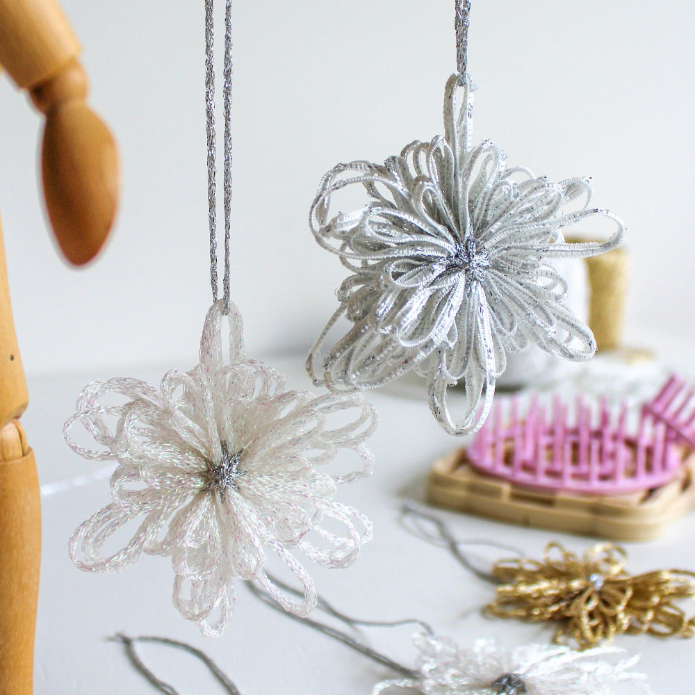 Christmas Stars made using Clover's Hana-Ami Flower Loom