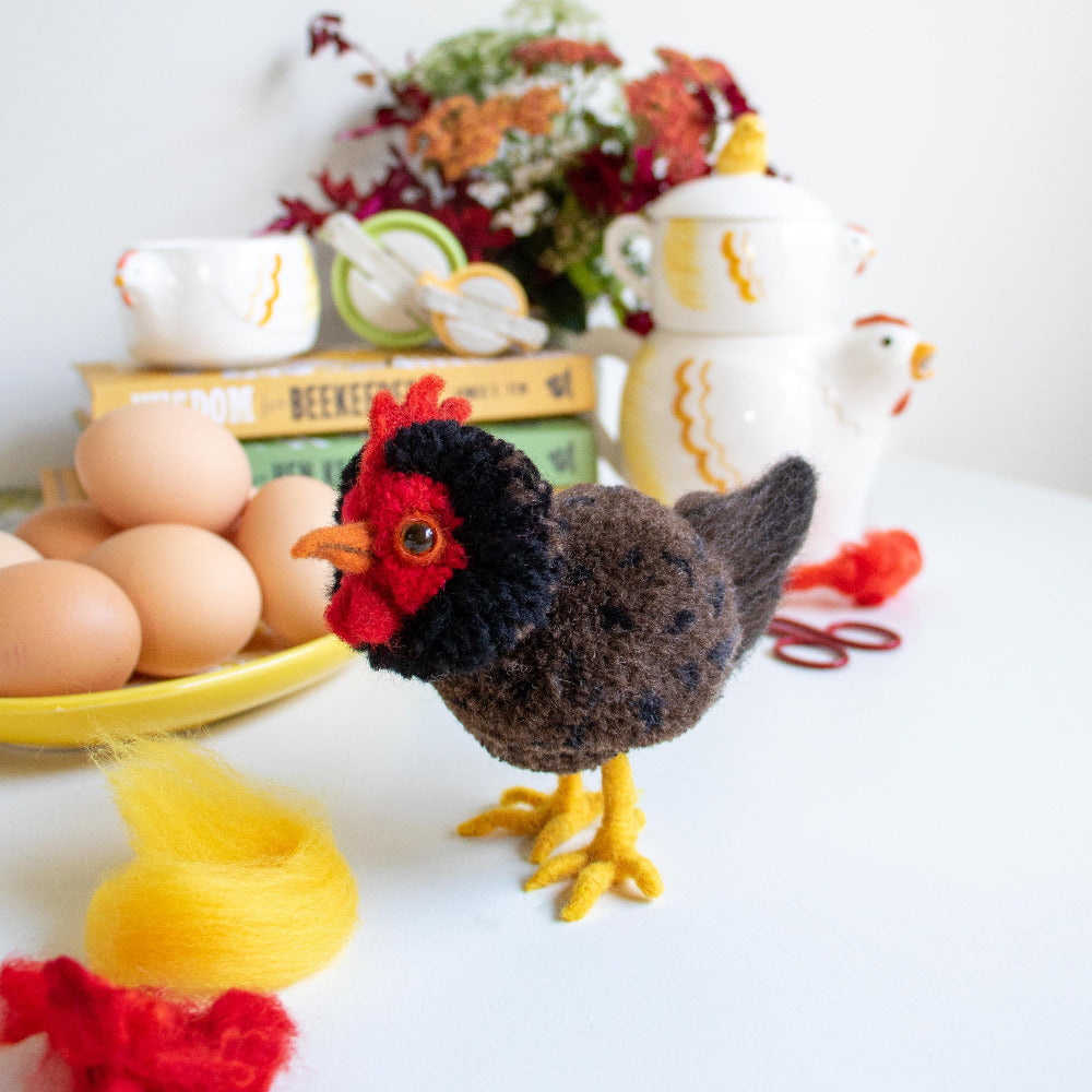Clover's Large Felting Mat can be used to create needle felted elements, or entire projects, such as the leags and tail of this Pom Pom Hen.