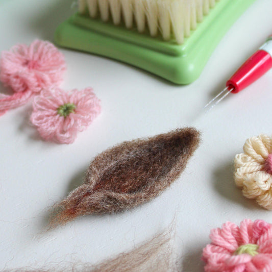 Clover's  Pen Style Needle Felting Tool let's you create felted elements or entire projects with ease.