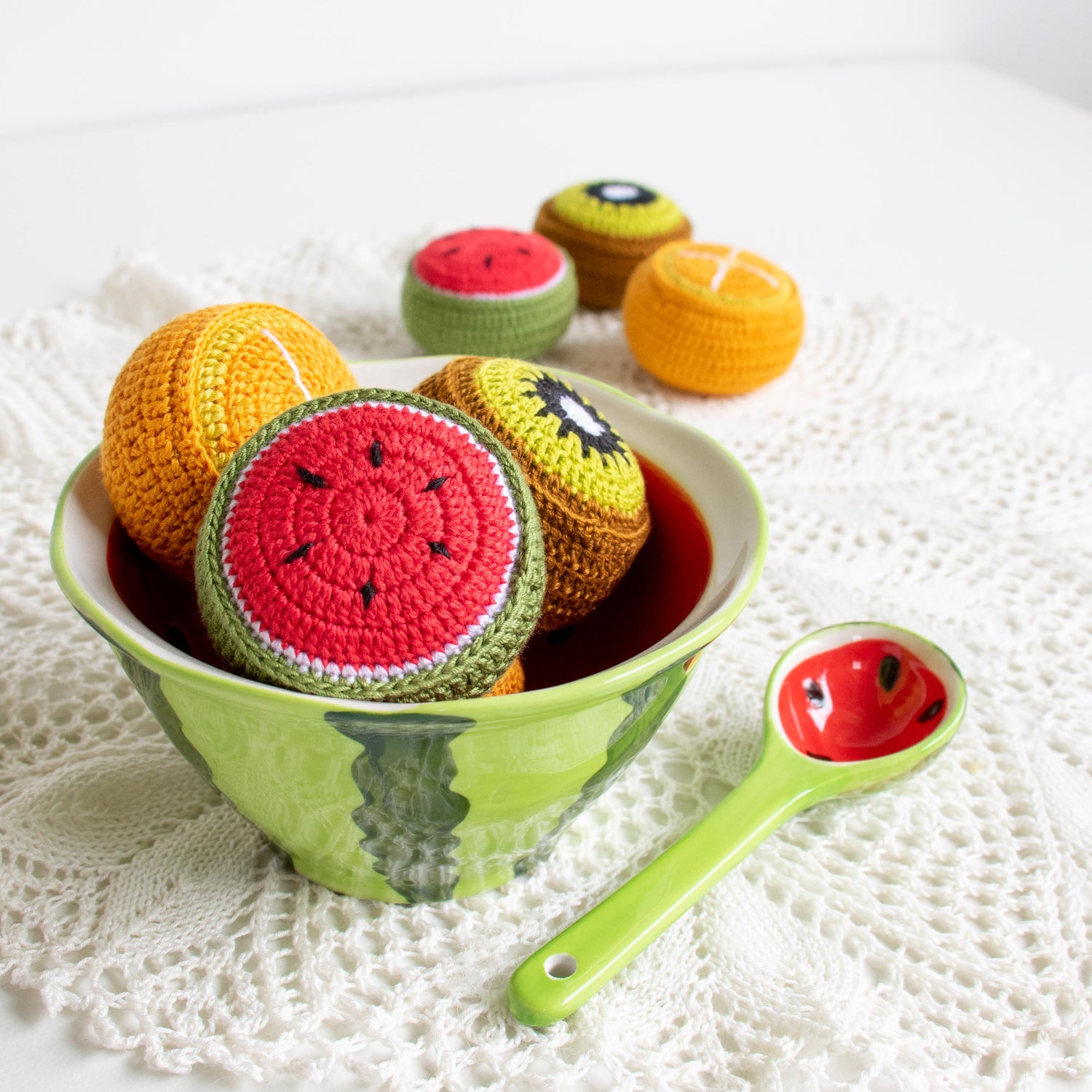 Beautiful hand crocheted fruit-inspired pin cushion/pattern weights can be found at The Krafty Mobile