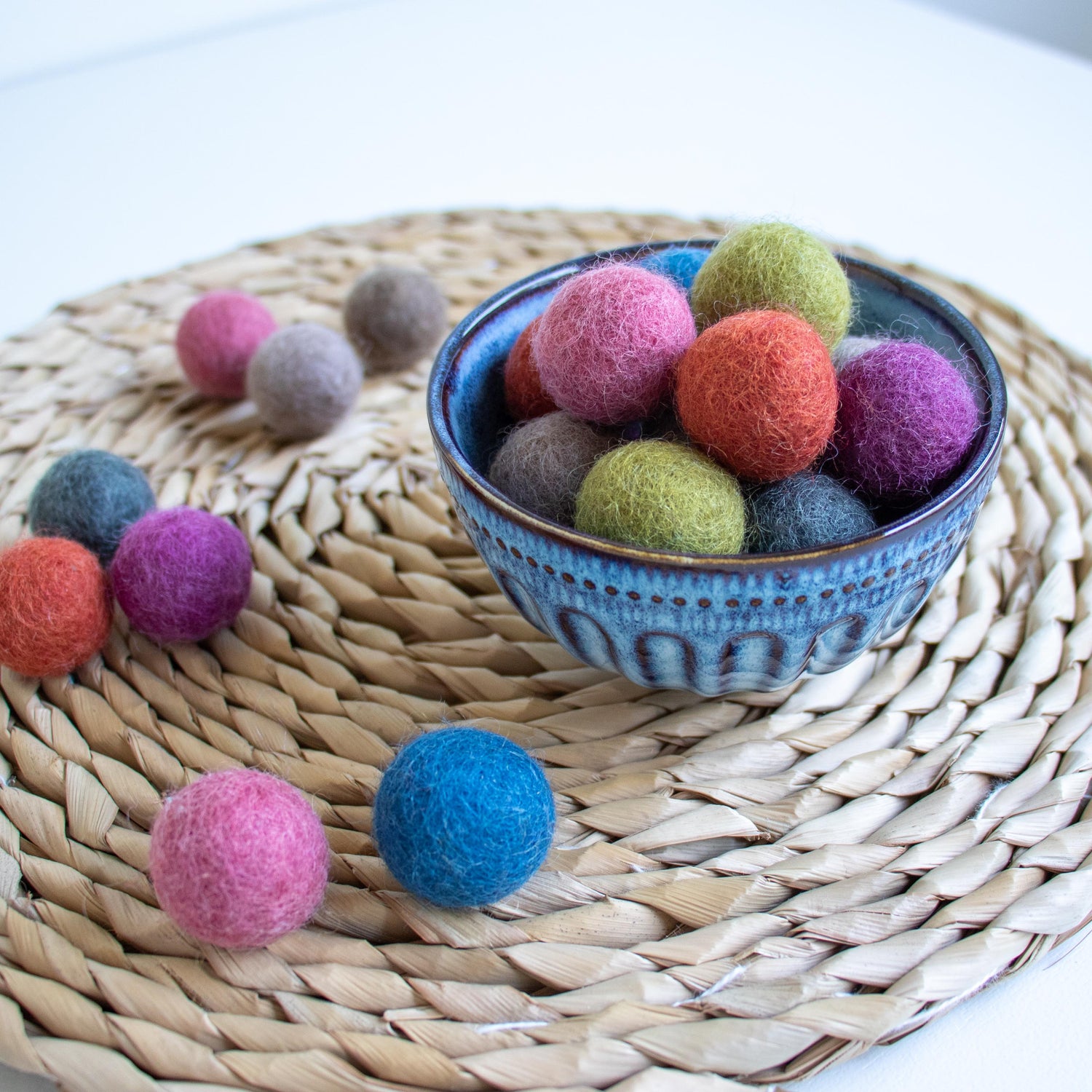 You can find a wide range of handcrafted wool felt balls, in lots of sizes and colours, at The Krafty Mobile.